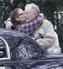 couple kissing goodbye