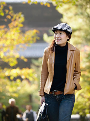 woman outside looking happy