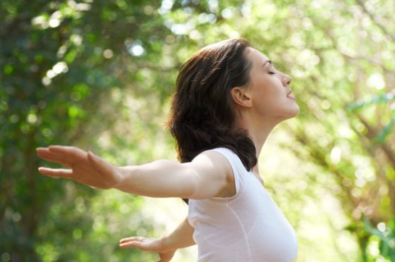 mindful peaceful woman in sunshine